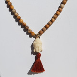 Collier Bouddha pompon marron