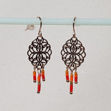 Boucles d'oreilles métal doré et perles orange