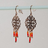 Boucles d'oreilles métal doré et perles orange