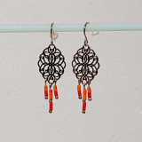 Boucles d'oreilles métal doré et perles orange