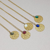 Collier médaille martelée et cristal Swarovski bleu
