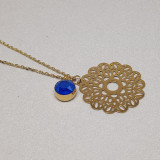 Sautoir doré rosace métal et cristal Swarovski bleu