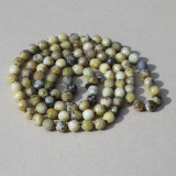 Collier perles gris vert