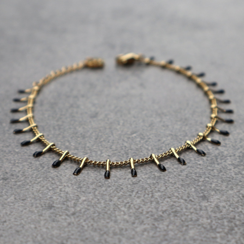 Bracelet petites pattes dorées et noires