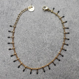 Bracelet petites pattes dorées et noires