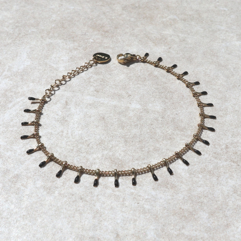 Bracelet petites pattes dorées et noires
