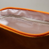 Pochette en daim à pompon, orange