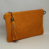Pochette en daim à pompon, orange
