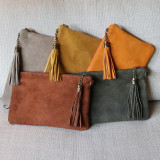 Pochette en daim à pompon, orange