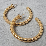 Boucles d'oreilles type créoles, dorées, oreilles percées