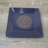 Vide-poches représentant un mandala doré sur fond gris