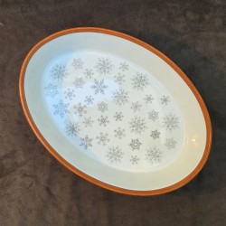 Plat four en porcelaine décoré de flocons