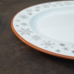 Plat ovale en porcelaine décoré de flocons