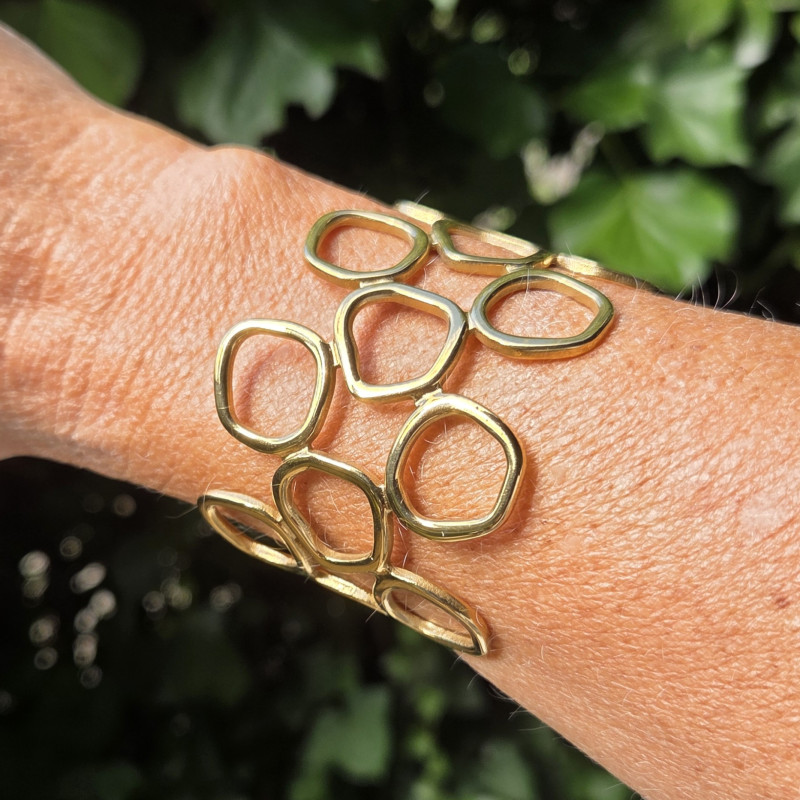 Bracelet manchette doré ajouré très élégant