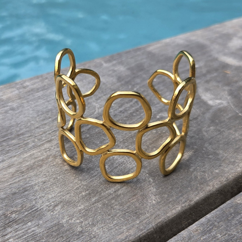 Bracelet manchette doré ajouré très élégant