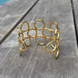 Bracelet manchette doré ajouré très élégant
