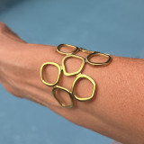 Bracelet manchette doré ajouré très élégant