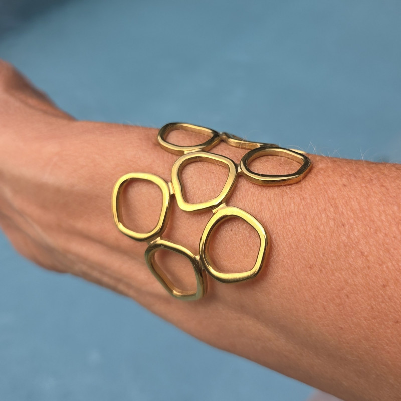 Bracelet manchette doré ajouré très élégant