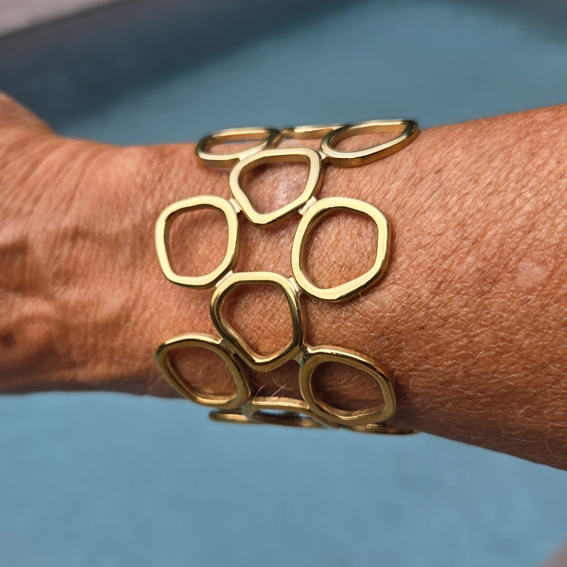 Bracelet manchette doré ajouré très élégant