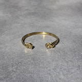 Bracelet jonc noué doré