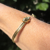 Bracelet jonc noué doré