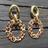 Boucles d'oreilles pendentif léopard ovale, fond marron