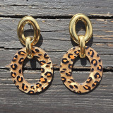 Boucles d'oreilles pendentif léopard ovale, fond marron